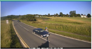 car passes a person on bike very closely on the road