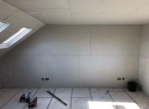 an image of a bright white plasterboard wall