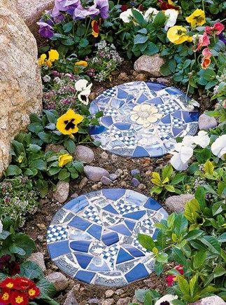 Intricate mosaic art adorning the garden, infusing vibrant colors and artistic flair into the outdoor sanctuary.