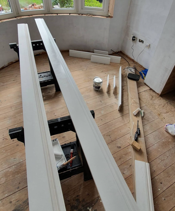 an image of skirting boards being prepared to be fit