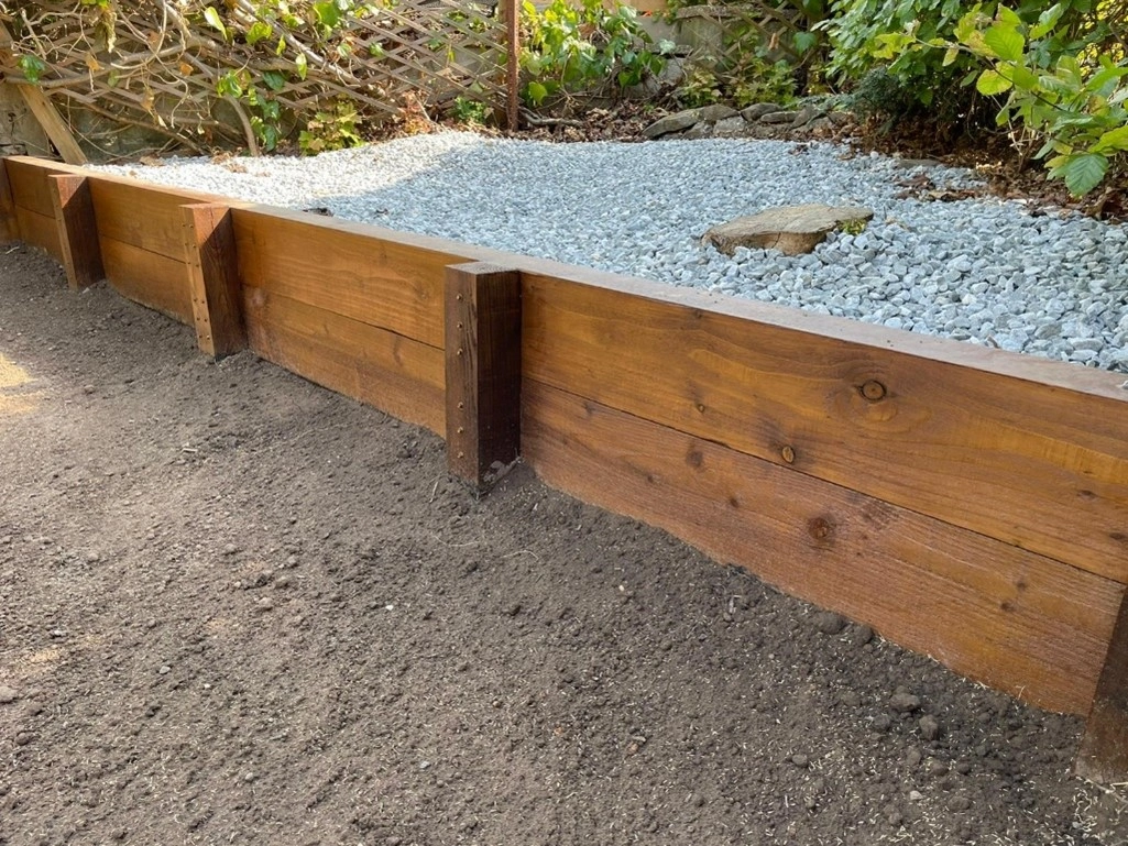 Strengthen your garden's structure and aesthetics with raised garden sleepers, ideal for constructing durable and visually appealing retaining walls, adding depth and character to your outdoor space.