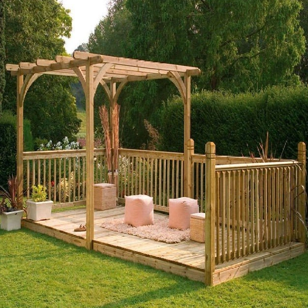 A pergola covering a deck is a stylish way to define your outdoor space. A pergola covering a deck is a stylish way to define your outdoor space.