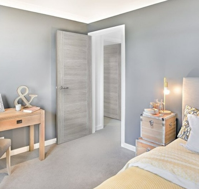 an image of a grey door in a grey modern bedroom