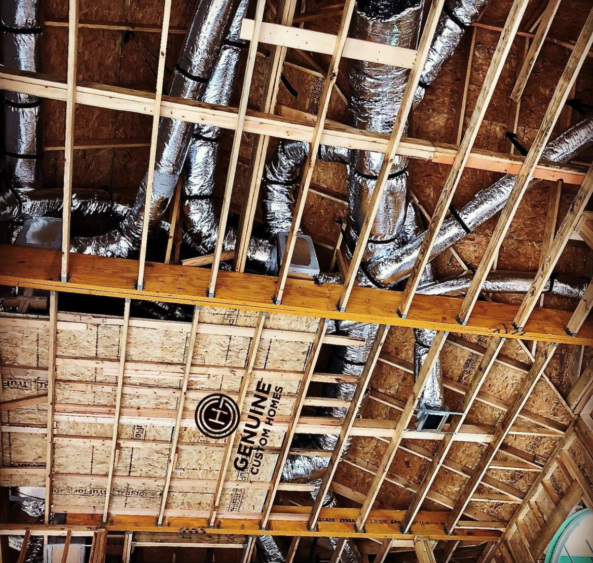 an image of a shed ceiling with piping exposed