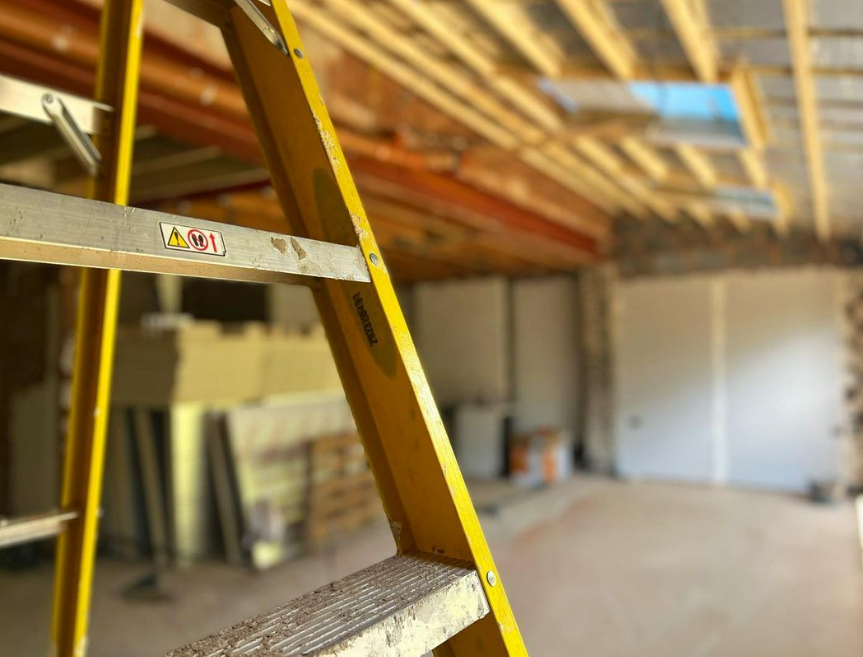 an image of a yellow Celotex ladder inside loft 
