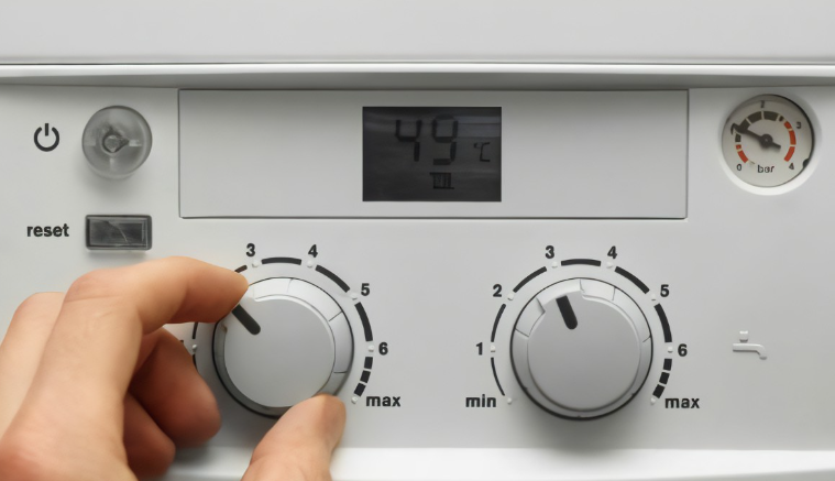 an image of a man adjusting central heating system via dials