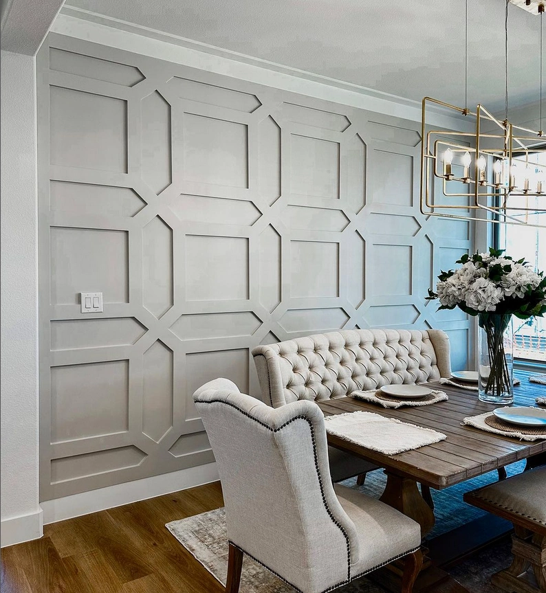 Different textured wall panelling used within a dining room of a home. Creates a traditional, vintage look to a space.