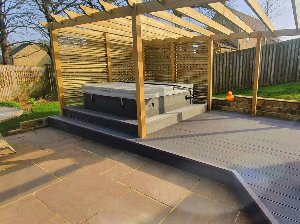 Create a retreat by incorporating a hot tub on top of your decking.